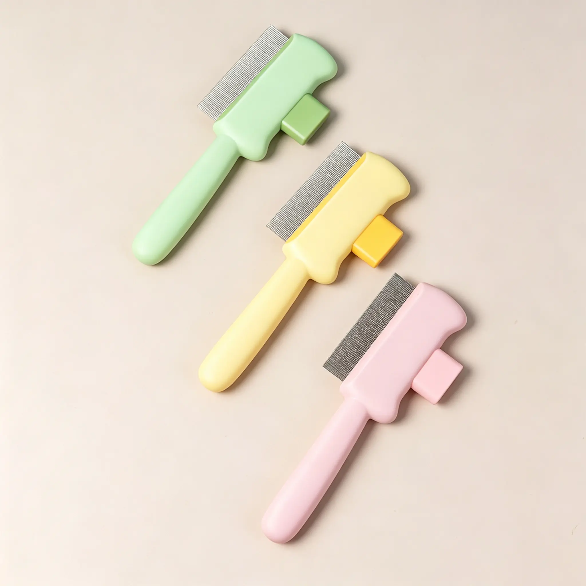 JH-S003 three pastel color pet shedding combs arranged together minimalist studio product image